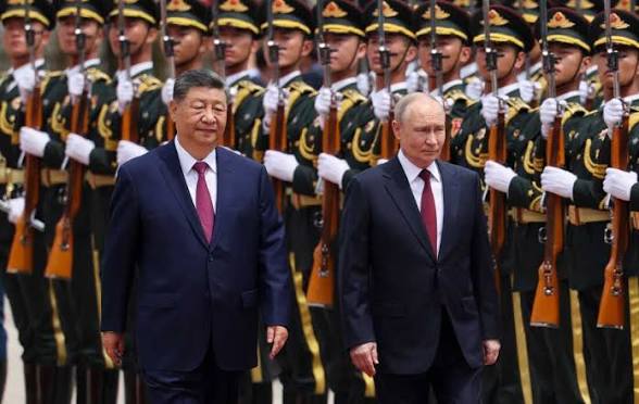 China Hosts Putin Days After Trump’s Visit